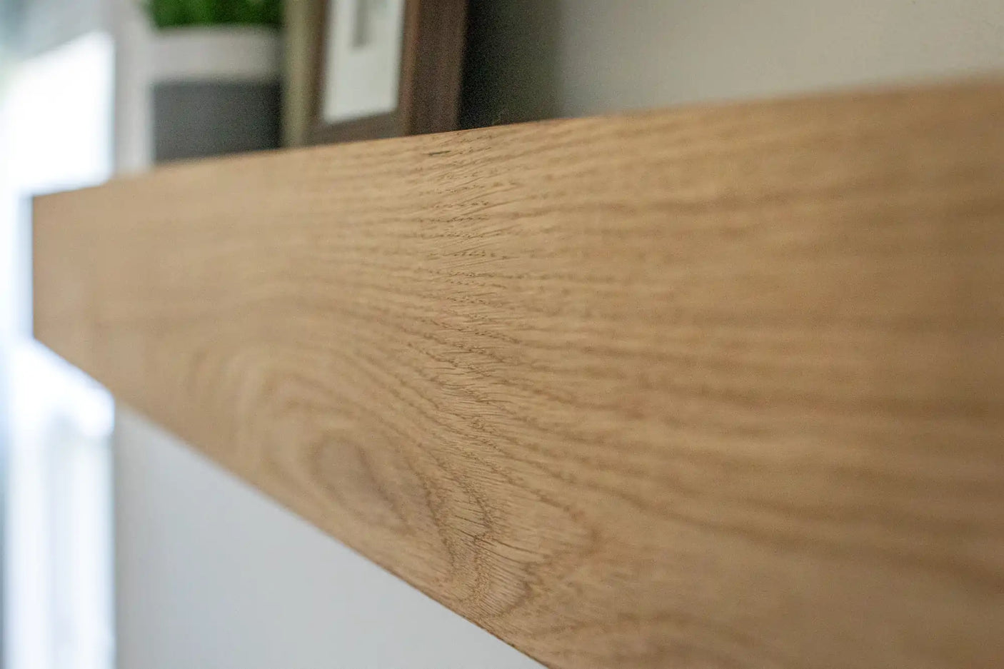 White oak box mantel with decorations