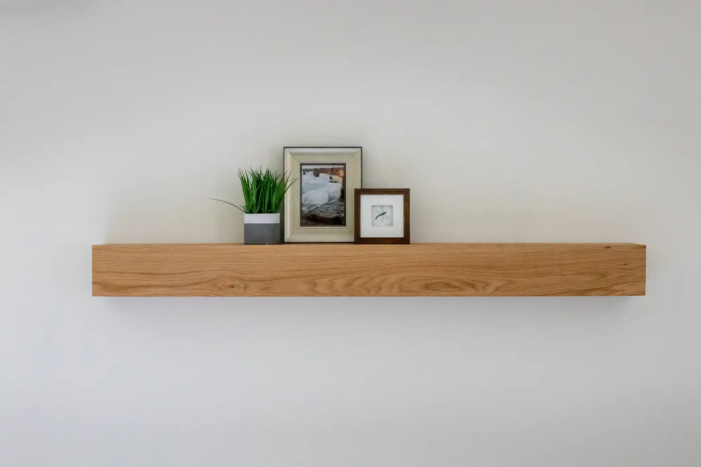 White oak box mantel with decorations