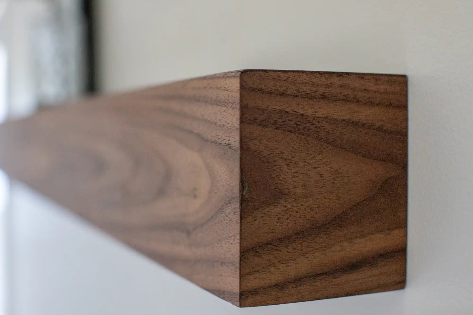 floating walnut mantel