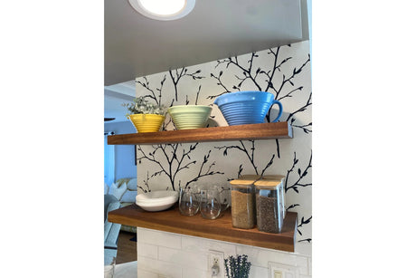 Walnut floating shelves in kitchen