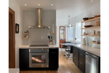 Maple floating shelves in kitchen