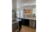 Maple floating shelves in kitchen