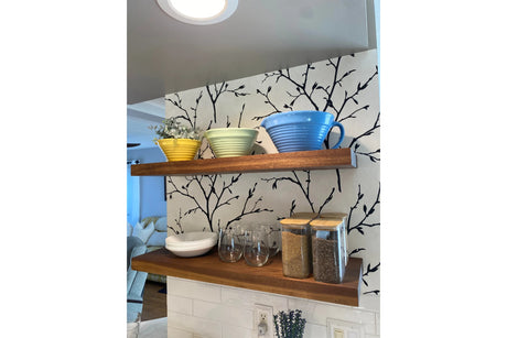 Walnut kitchen shelves and wallpaper