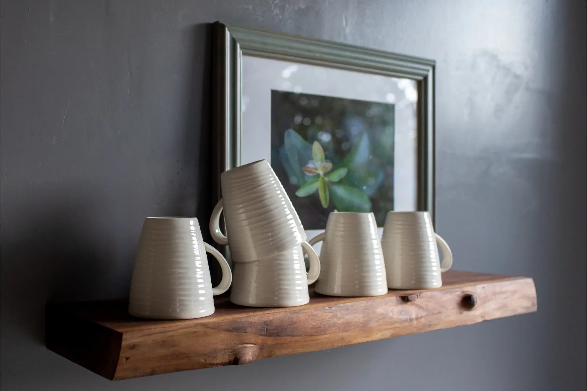 live edge walnut floating shelf with mugs